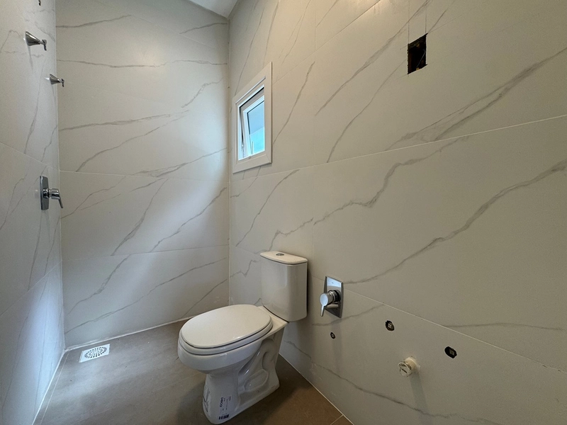 Sobrado com arquitetura uníca, condomínio no centro de Xangri-Lá: 15ª foto da galeria de imagens do imóvel