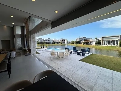Linda Casa à beira do lago no condomínio Riviera. : 22ª foto da galeria de imagens do imóvel