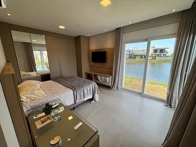 Linda Casa à beira do lago no condomínio Riviera. : 16ª foto da galeria de imagens do imóvel