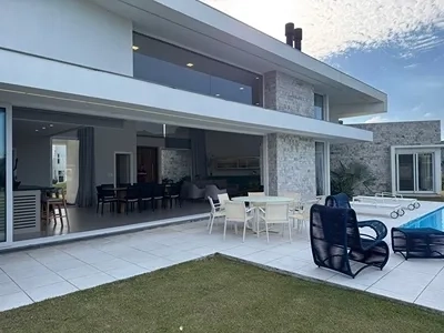 Linda Casa à beira do lago no condomínio Riviera. : 14ª foto da galeria de imagens do imóvel