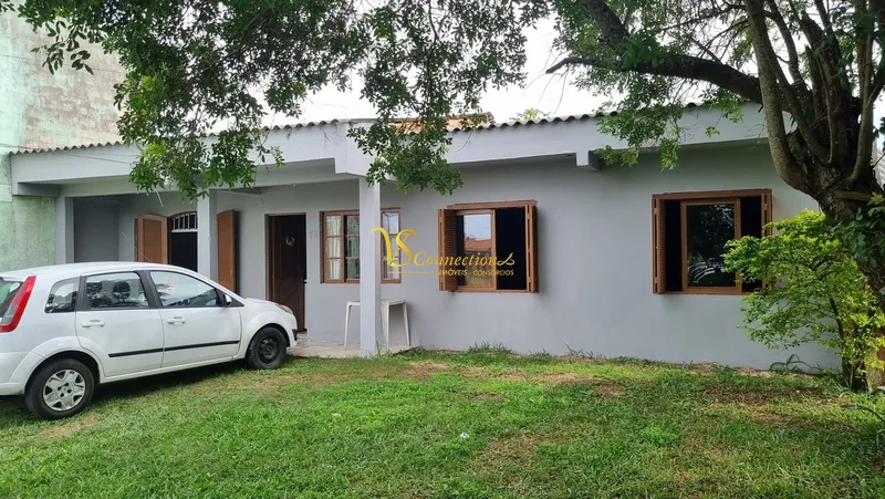 Casa à venda com laje em Atlântida Sul: 1ª foto da galeria de imagens do imóvel
