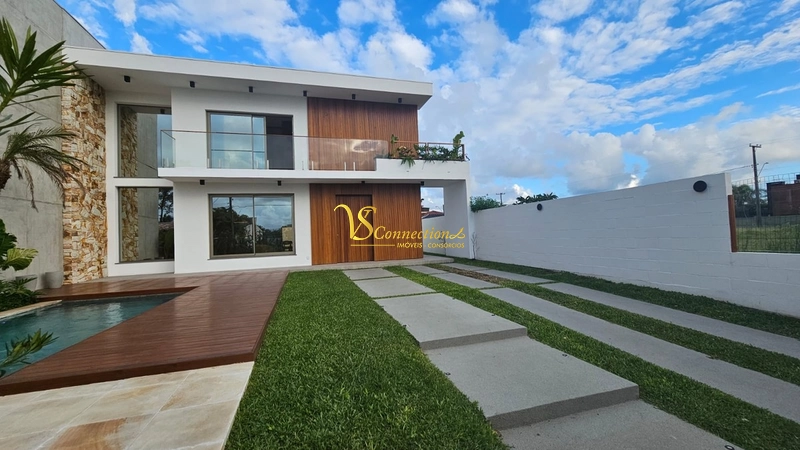 Casa a poucos metros do mar em XANGRI-LÁ: 1ª foto da galeria de imagens do imóvel