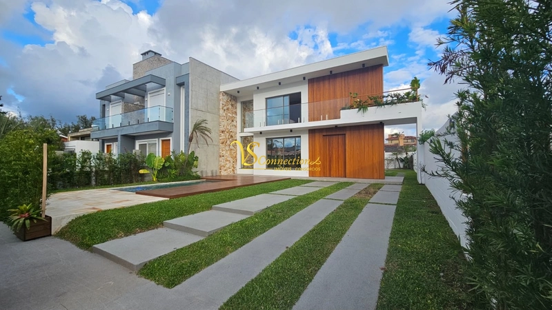Casa a poucos metros do mar em XANGRI-LÁ: 5ª foto da galeria de imagens do imóvel