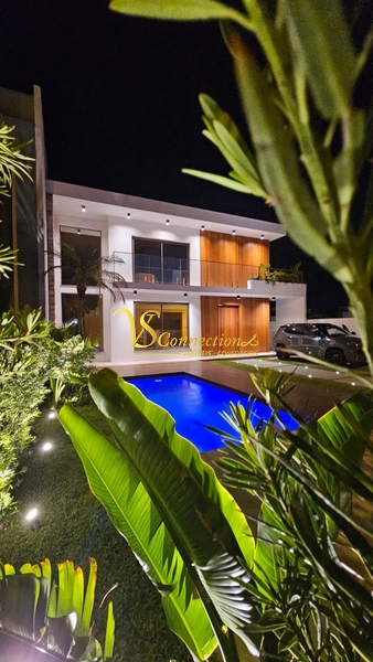 Casa a poucos metros do mar em XANGRI-LÁ: 2ª foto da galeria de imagens do imóvel
