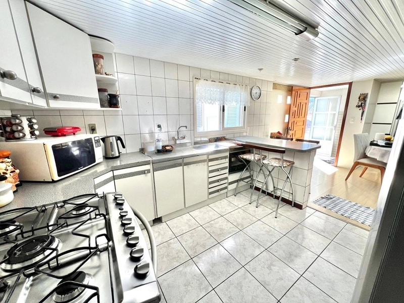 Casa 4 dormitórios no Sagrada Família: 6ª foto da galeria de imagens do imóvel