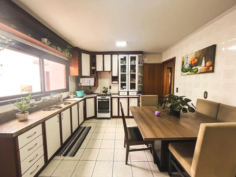 Apartamento semimobiliado com 3 dormitórios e terraço no Santa Catarina: 1ª foto da galeria de imagens do imóvel