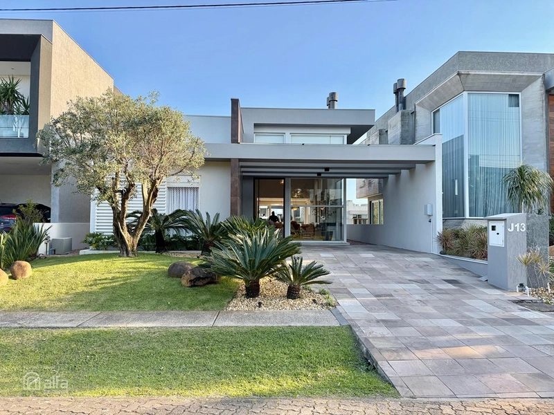 casa térrea beira lago no condominio Capão Ilhas Resort : 1ª foto da galeria de imagens do imóvel