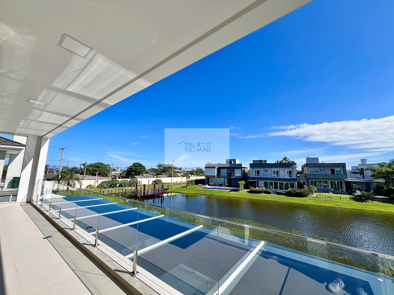 Casa beira lago em condomínio fechado!: 6ª foto da galeria de imagens do imóvel