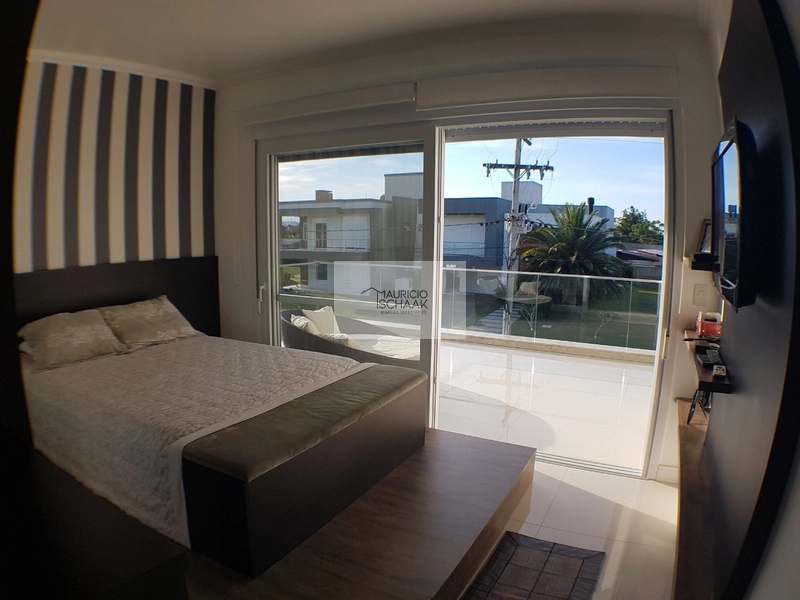 Casa em condomínio fechado em Atlântida: 5ª foto da galeria de imagens do imóvel