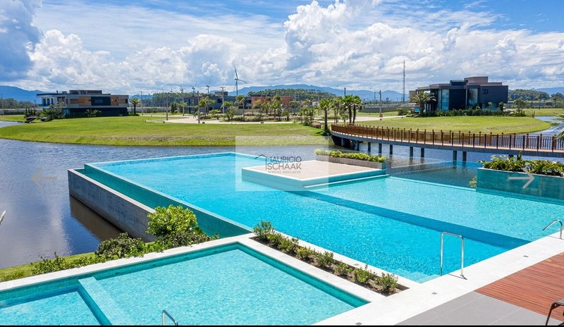 Lote beira lago em condomínio fechado: 5ª foto da galeria de imagens do imóvel