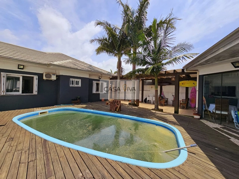 CASA COM QUATRO DORMITÓRIOS E PISCINA.: 11ª foto da galeria de imagens do imóvel