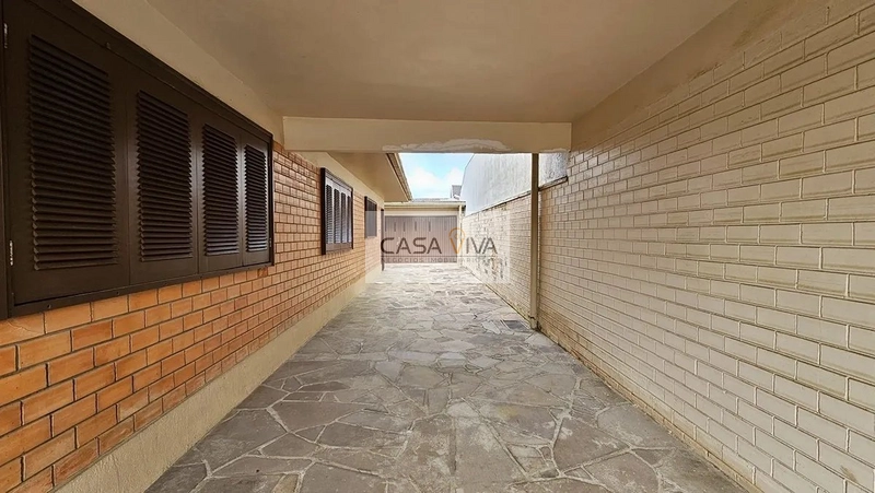 Casa com 03 Dormitórios a Uma Quadra do M.ar: 10ª foto da galeria de imagens do imóvel