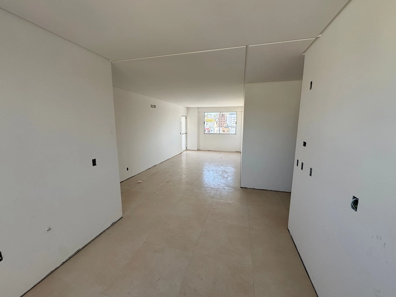 APARTAMENTO COM 1 SUÍTE E 1 QUARTO NO CENTRO - RESIDENCIAL BERLATTORRE: 2ª foto da galeria de imagens do imóvel
