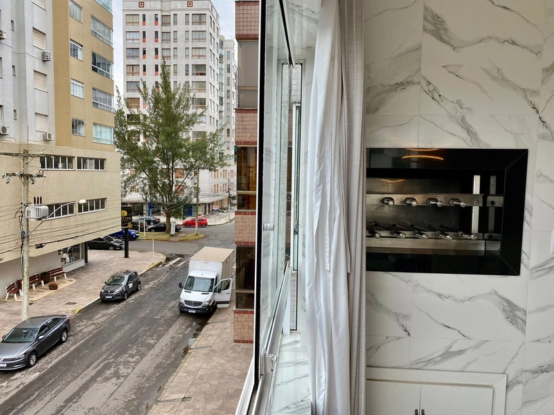 CENTRO COM SACADA DE FRENTE E CHURRASQUEIRA: 6ª foto da galeria de imagens do imóvel