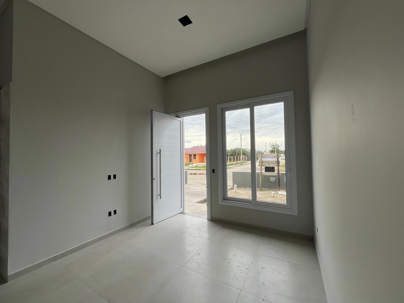 CASA GEMINADA  DE ESQUINA NO BAIRRO NOIVA DO MAR: 2ª foto da galeria de imagens do imóvel