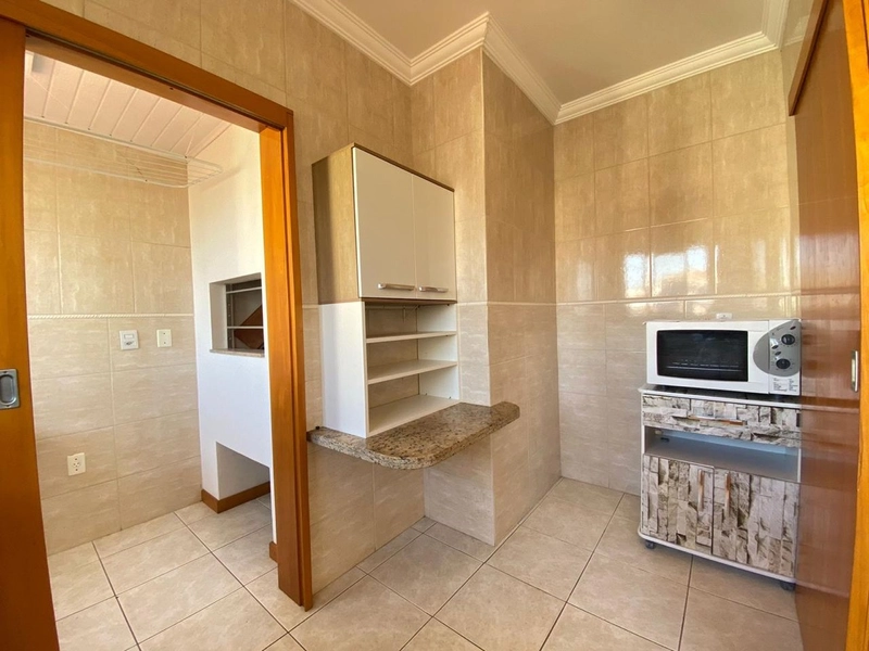 APARTAMENTO COM VISTA PARA SERRA! PRÓXIMO A PRAÇA LUÍS BASSANI!: 2ª foto da galeria de imagens do imóvel