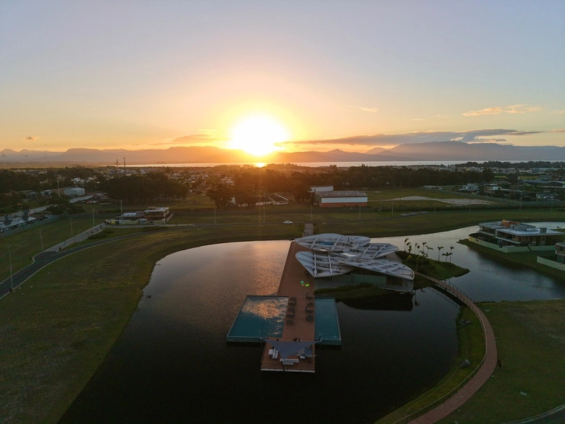 Lote/Terreno beira lago à venda no condomínio Lótus em Atlântida: 19ª foto da galeria de imagens do imóvel