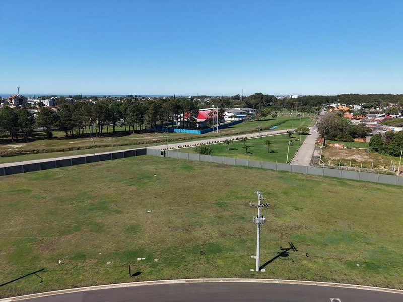 Lote/Terreno à venda no condomínio Lótus em Atlântida: 3ª foto da galeria de imagens do imóvel