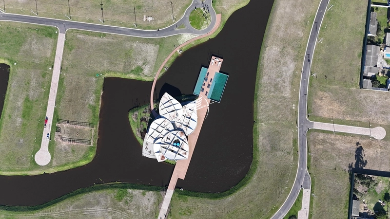 Lote/Terreno beira lago à venda no condomínio Lótus em Atlântida: 11ª foto da galeria de imagens do imóvel