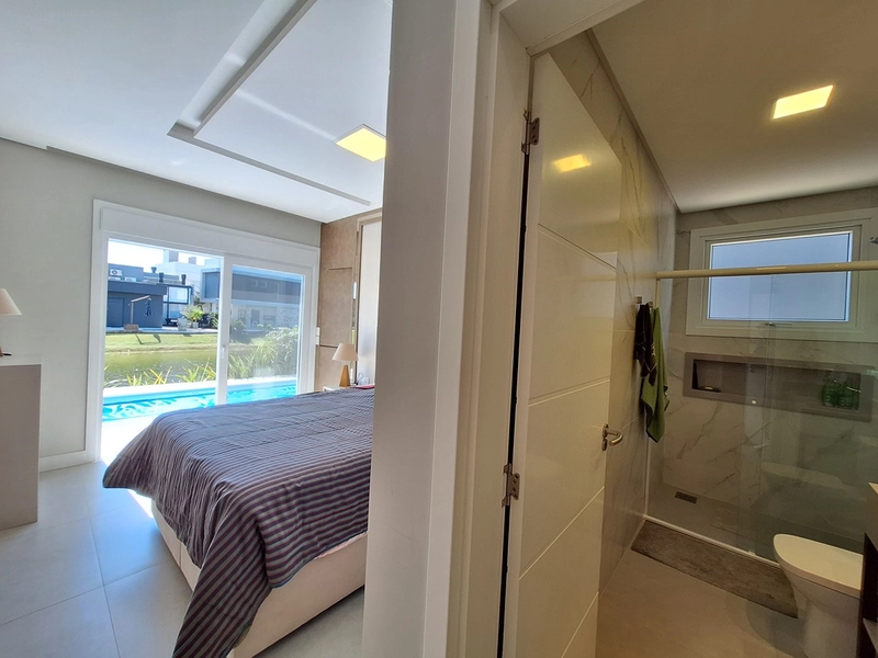 Casa térrea beira lago no condomínio Riviera em Xangri-Lá: 54ª foto da galeria de imagens do imóvel