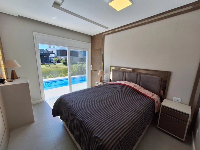 Casa térrea beira lago no condomínio Riviera em Xangri-Lá: 56ª foto da galeria de imagens do imóvel