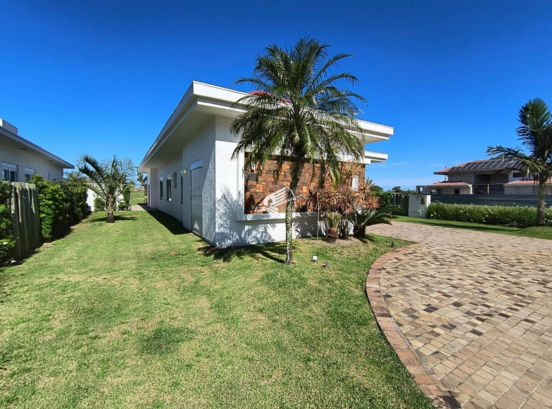 Casa à venda no condomínio Green Village Golf Club em Xangri-Lá: 1ª foto da galeria de imagens do imóvel