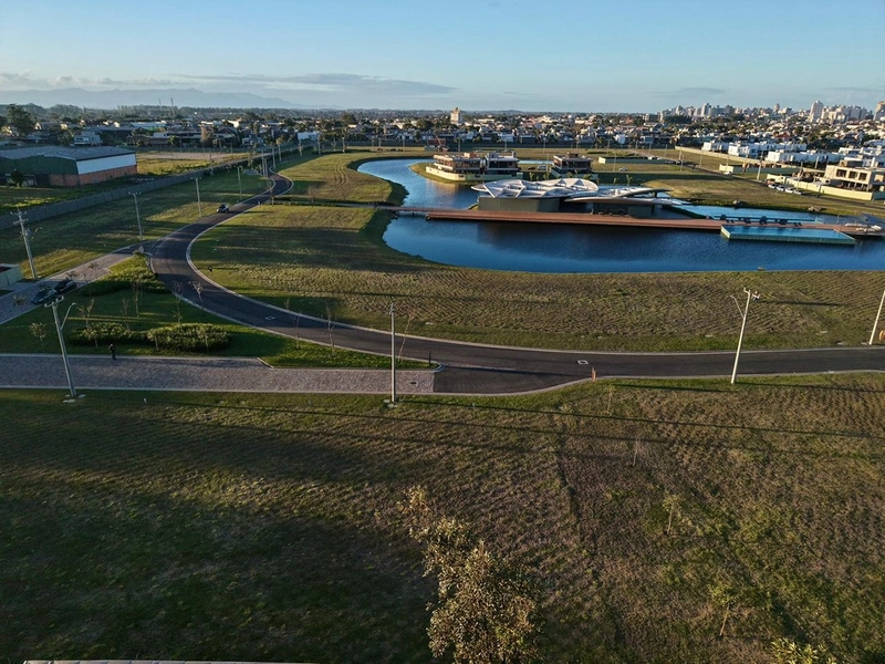 Lote/Terreno à venda no condomínio Lótus em Atlântida: 1ª foto da galeria de imagens do imóvel