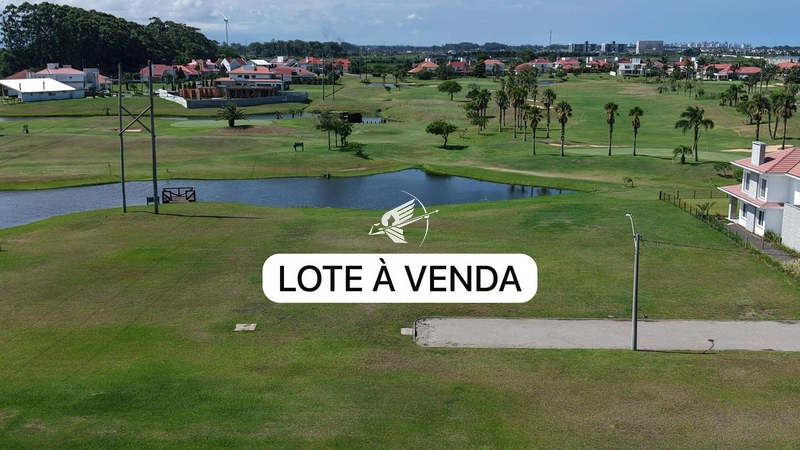 Lote/Terreno beira lago à venda no condomínio Green Village Golf Club: 1ª foto da galeria de imagens do imóvel