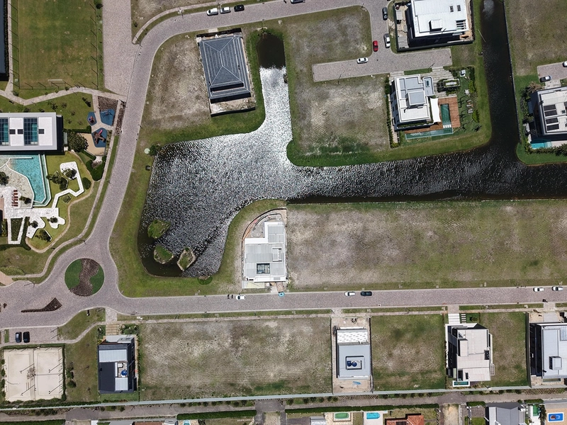 Lote/Terreno beira lago no condomínio Los Cobos em Xangri-Lá: 23ª foto da galeria de imagens do imóvel