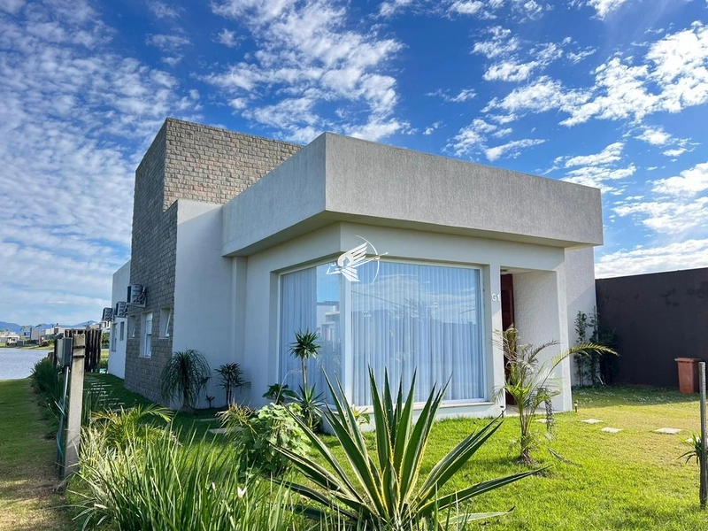 Casa à venda no condomínio Riviera em Xangri-Lá: 2ª foto da galeria de imagens do imóvel