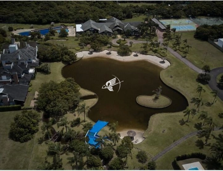 Terreno á venda no condomínio Bosques de Atlântida: 6ª foto da galeria de imagens do imóvel