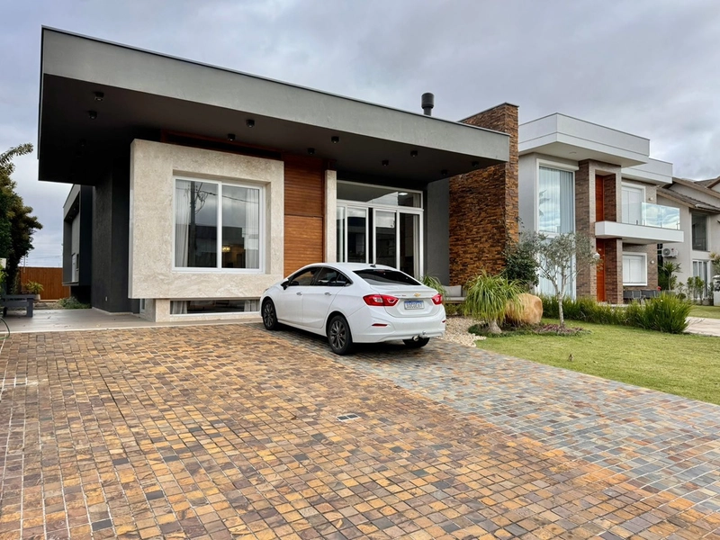 Casa à venda no condomínio Villagio Atlântida: 3ª foto da galeria de imagens do imóvel