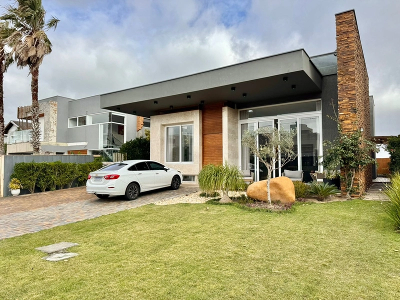 Casa à venda no condomínio Villagio Atlântida: 2ª foto da galeria de imagens do imóvel