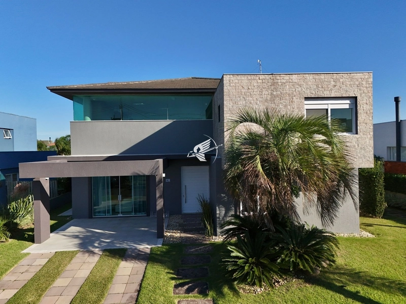 Casa beira lago à venda no condomínio Quintas do Lago: 3ª foto da galeria de imagens do imóvel