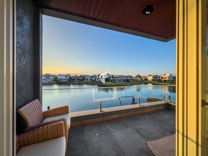 Casa beira lago à venda no condomínio Celebration em Xangri-Lá: 44ª foto da galeria de imagens do imóvel