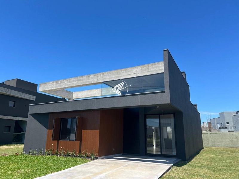 Casa à venda no condomínio Sunset em Xangri-Lá: 1ª foto da galeria de imagens do imóvel