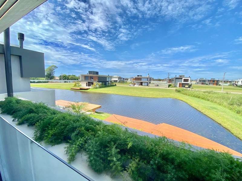 Casa à venda no condomínio Amare Home Resort em Xangri-Lá: 4ª foto da galeria de imagens do imóvel