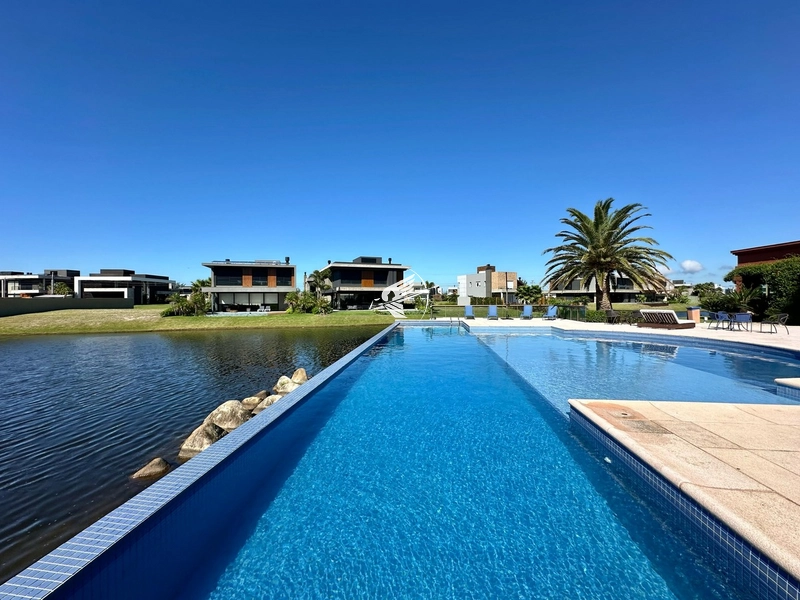 Lote/Terreno Beira Lago à venda no condomínio Celebration em Xangri-Lá: 11ª foto da galeria de imagens do imóvel
