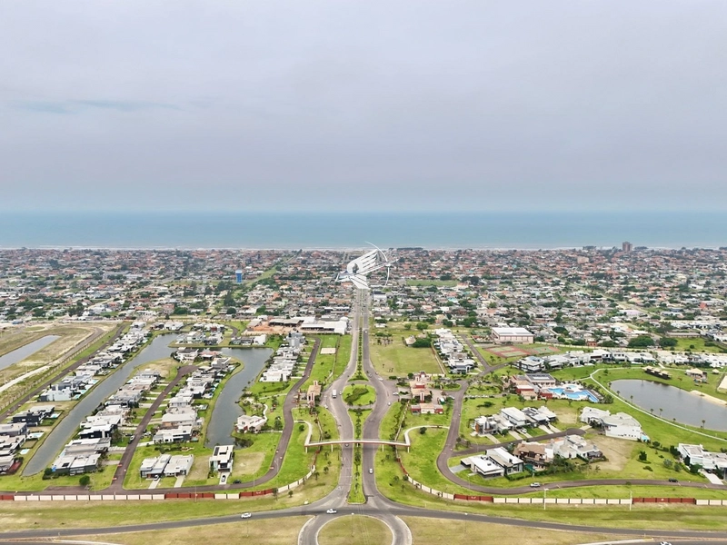 Lote/Terreno beira lago à venda no condomínio Riviera em Xangri-Lá: 62ª foto da galeria de imagens do imóvel