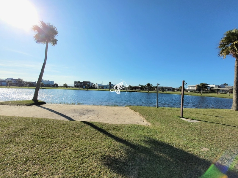Lote/Terreno beira lago à venda no condomínio Riviera em Xangri-Lá: 33ª foto da galeria de imagens do imóvel