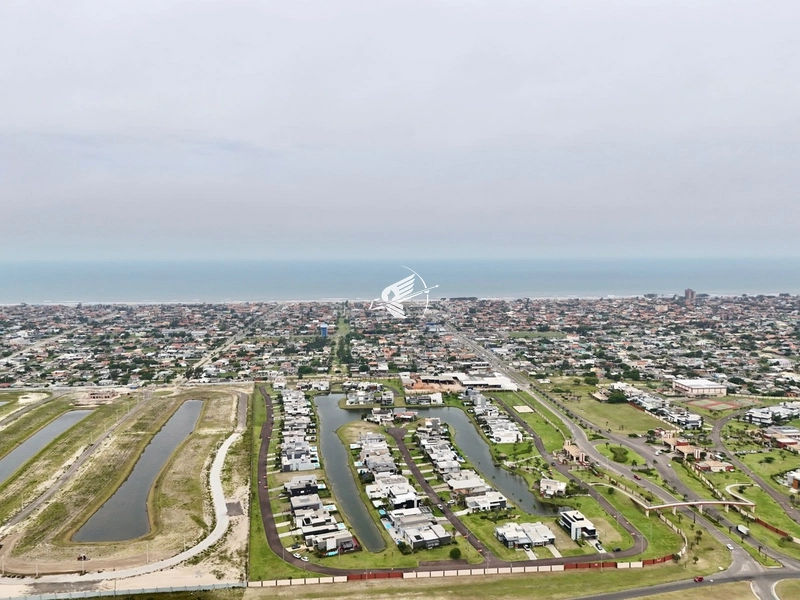 Lote/Terreno beira lago à venda no condomínio Riviera em Xangri-Lá: 60ª foto da galeria de imagens do imóvel