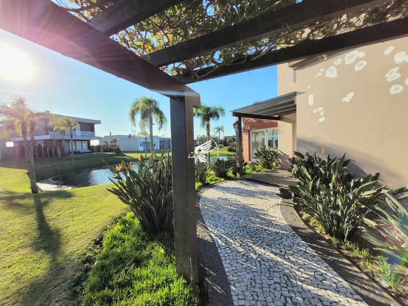 Lote/Terreno beira lago à venda no condomínio Riviera em Xangri-Lá: 39ª foto da galeria de imagens do imóvel