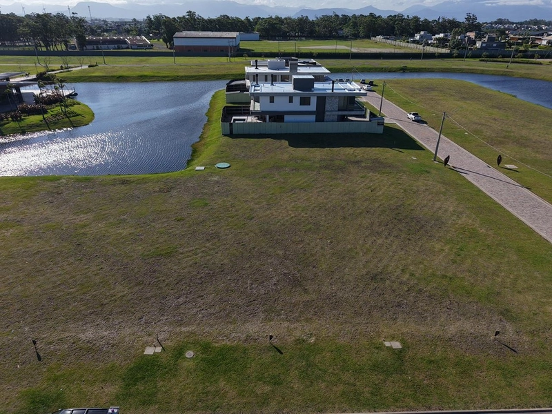 Lote/Terreno à venda no condomínio Lótus em Atlântida: 1ª foto da galeria de imagens do imóvel