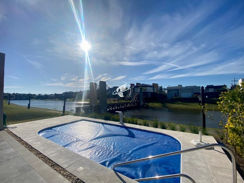 Casa beira lago à venda no condomínio Capão Ilhas Resort: 4ª foto da galeria de imagens do imóvel