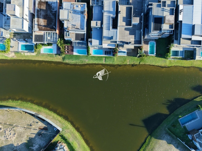 Casa beira lago à venda no condomínio Riviera em Xangri-Lá: 3ª foto da galeria de imagens do imóvel