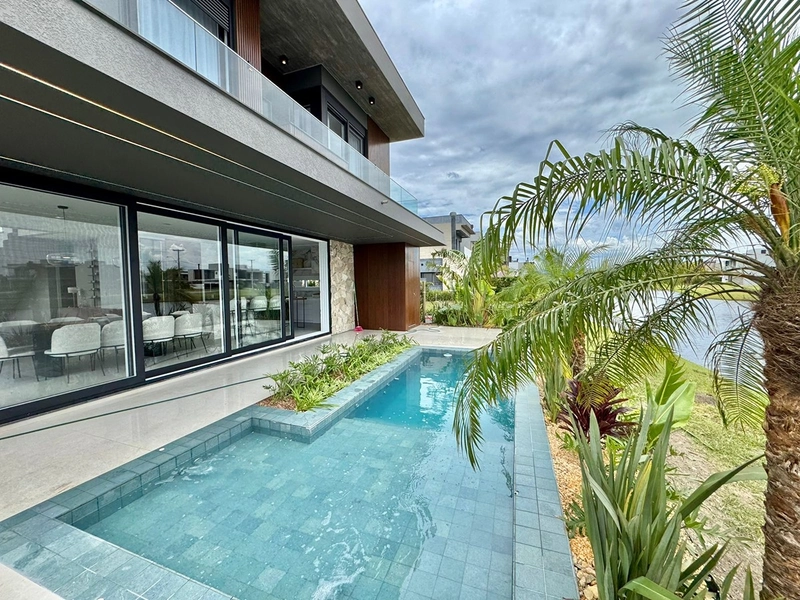 Sobrado beira lago no condomínio Sunset em Xangri-Lá: 6ª foto da galeria de imagens do imóvel