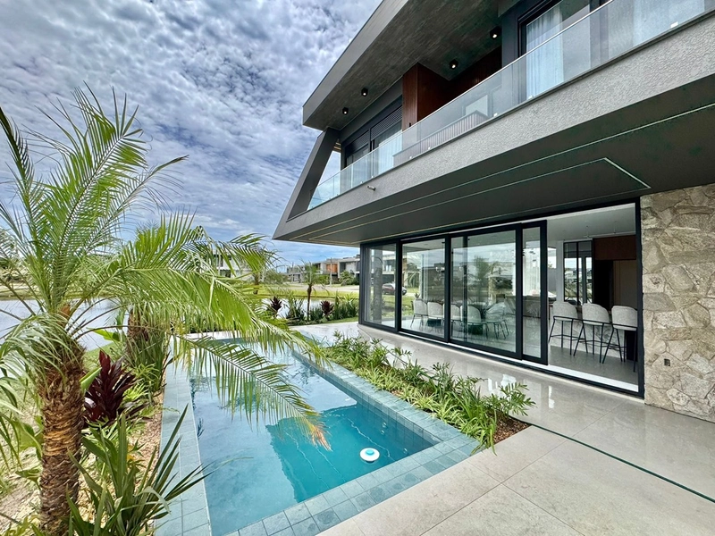 Sobrado beira lago no condomínio Sunset em Xangri-Lá: 7ª foto da galeria de imagens do imóvel