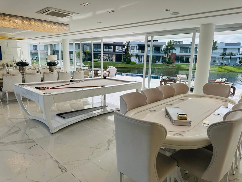 Mansão beira lago no condomínio Enseada Lagos em Xangri-Lá: 7ª foto da galeria de imagens do imóvel