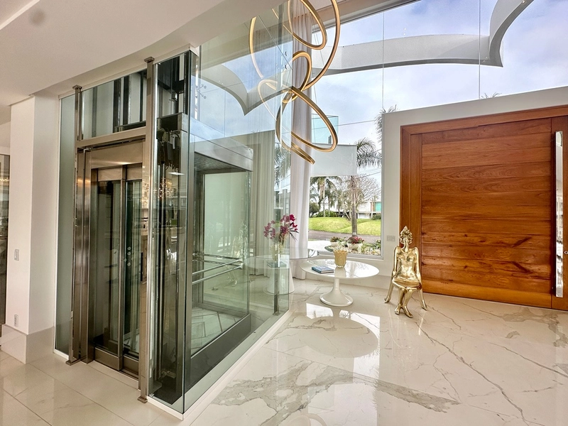 Mansão beira lago no condomínio Enseada Lagos em Xangri-Lá: 3ª foto da galeria de imagens do imóvel