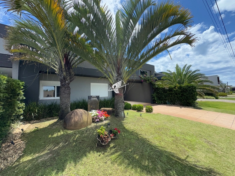 Casa térrea à venda no condomínio Riviera em Xangri-Lá: 1ª foto da galeria de imagens do imóvel